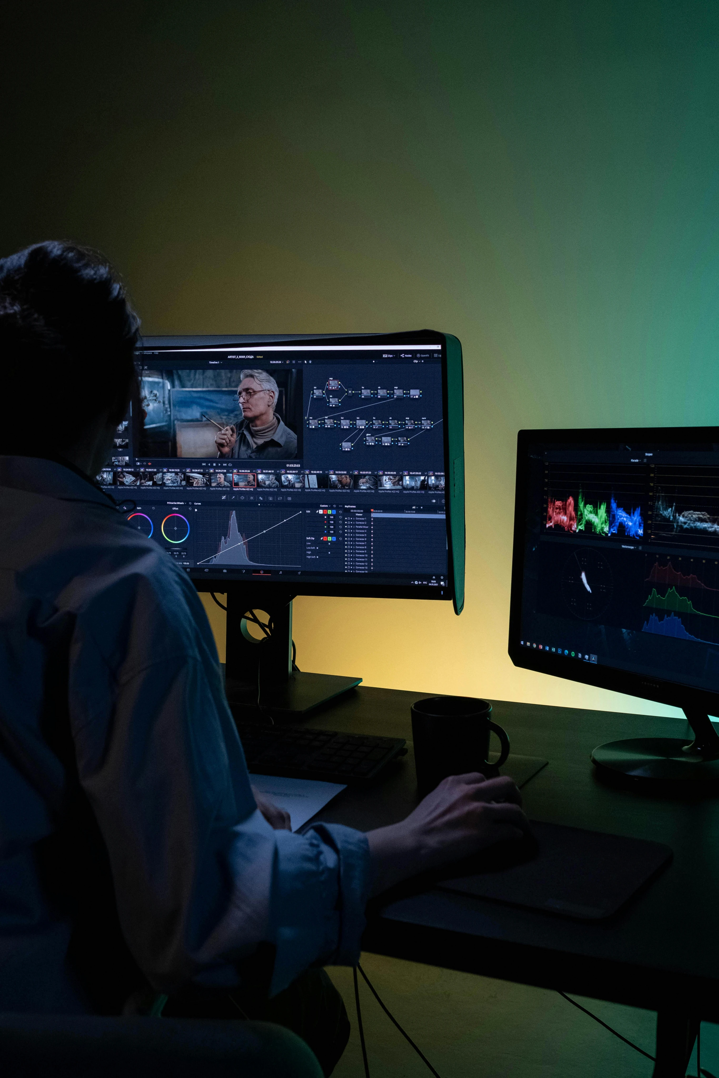 Video editor working in a professional editing suite